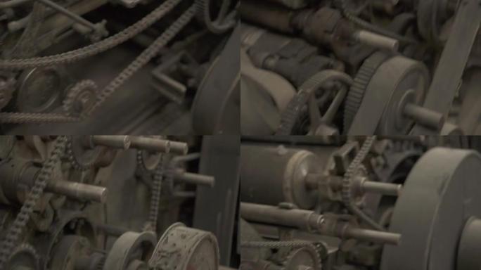 工厂的机器。织造厂的旧织机。设备内部的机构和弹簧