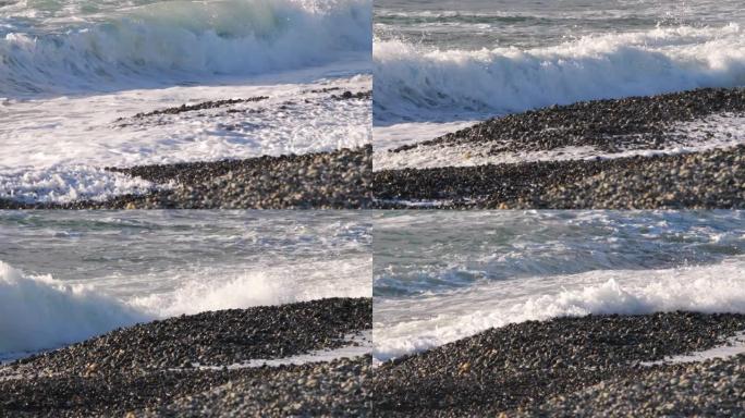 海浪滚滚到圆石滩上