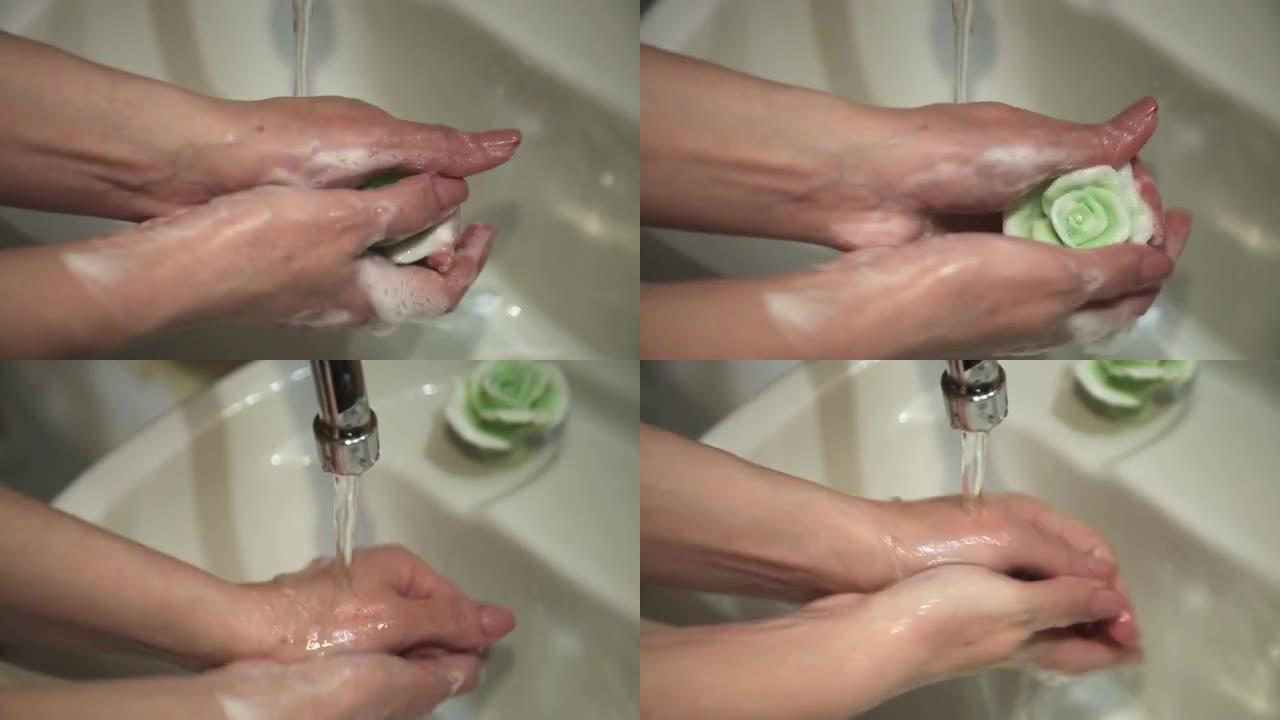 女性手中的花朵形状的手工皂