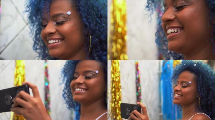 快乐的非洲女人在互联网上观看狂欢节视频