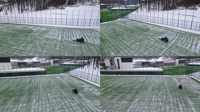 从雪地上清理足球场。落在足球场上的雪。清理足球场上积雪的机器。为冬季比赛准备足球场