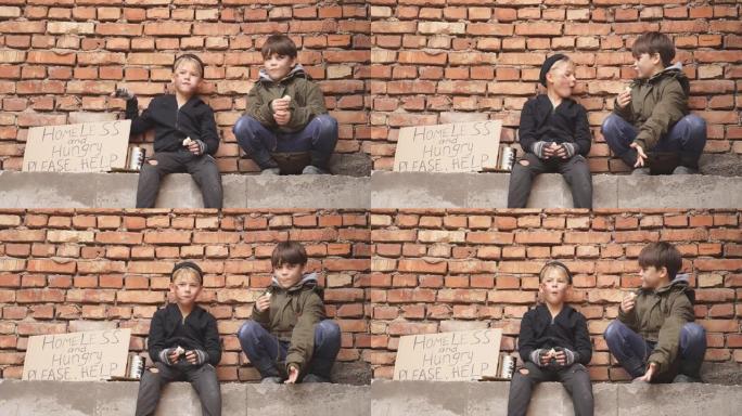 两个可怜的街头男孩需要帮助，向陌生人求助，在大城市的街道上乞讨食物