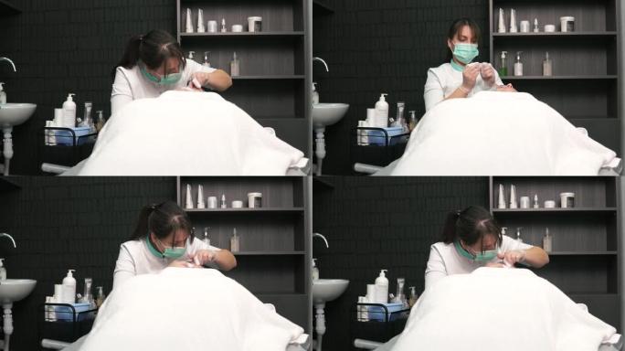 美容师女人机械地清洁粉刺和黑头的脸。