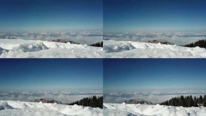 山里的雪林，云层之上