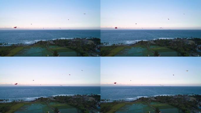 傍晚鸟瞰图时，风筝在天空中飞翔。