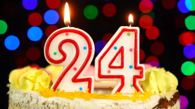24号生日快乐蛋糕Witg燃烧蜡烛礼帽。