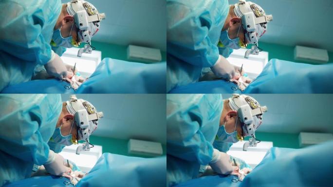 头部手术手电筒专业医生的侧视图。外科医生在手术室使用医疗工具对患者进行手术。特写。