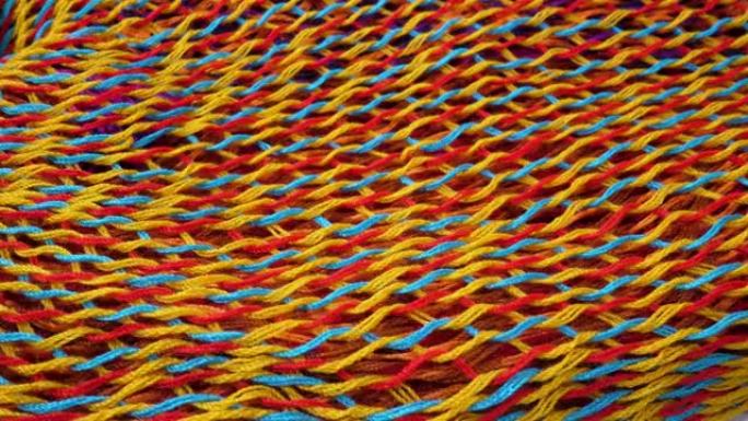 蓝色、红色、黄色针织面料抽象背景面料
