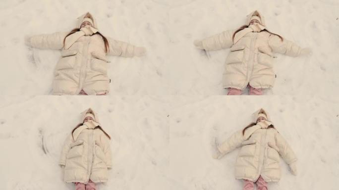 女学生躺在雪地上，让天使形象