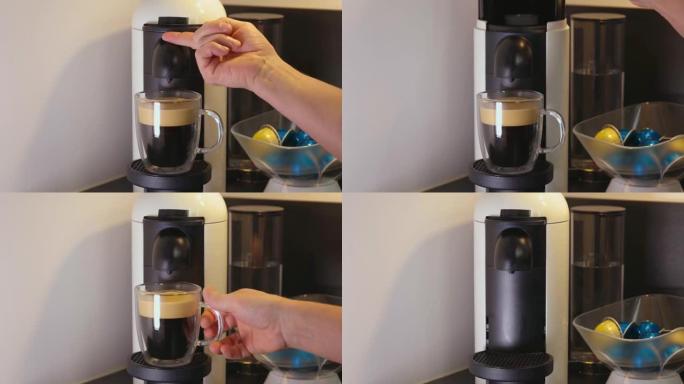 咖啡冲泡过程结束的特写视图。从雀巢机器清空胶囊。