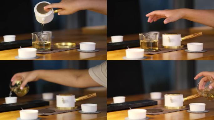 将茶水从传统的中国茶壶倒入公平的杯子和茶杯中
