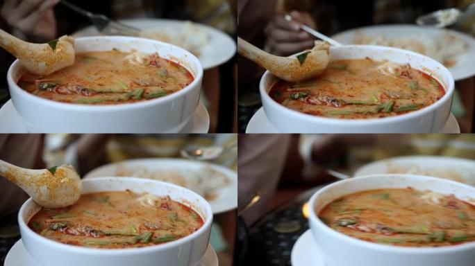 在餐厅吃虾汤，生活方式概念。