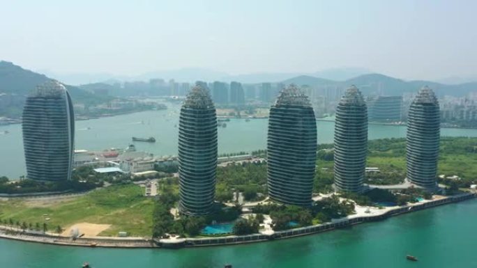 阳光灿烂的海南岛三亚著名酒店航空全景4k中国