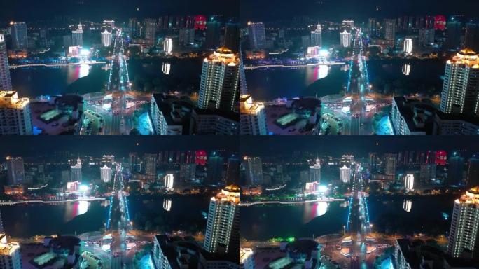 夜光海南岛三亚市交通街河桥空中俯视图4k中国