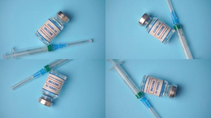 冠状病毒covid疫苗在医学实验室的蓝色背景上旋转。接种疫苗，防止冠状病毒大流行。