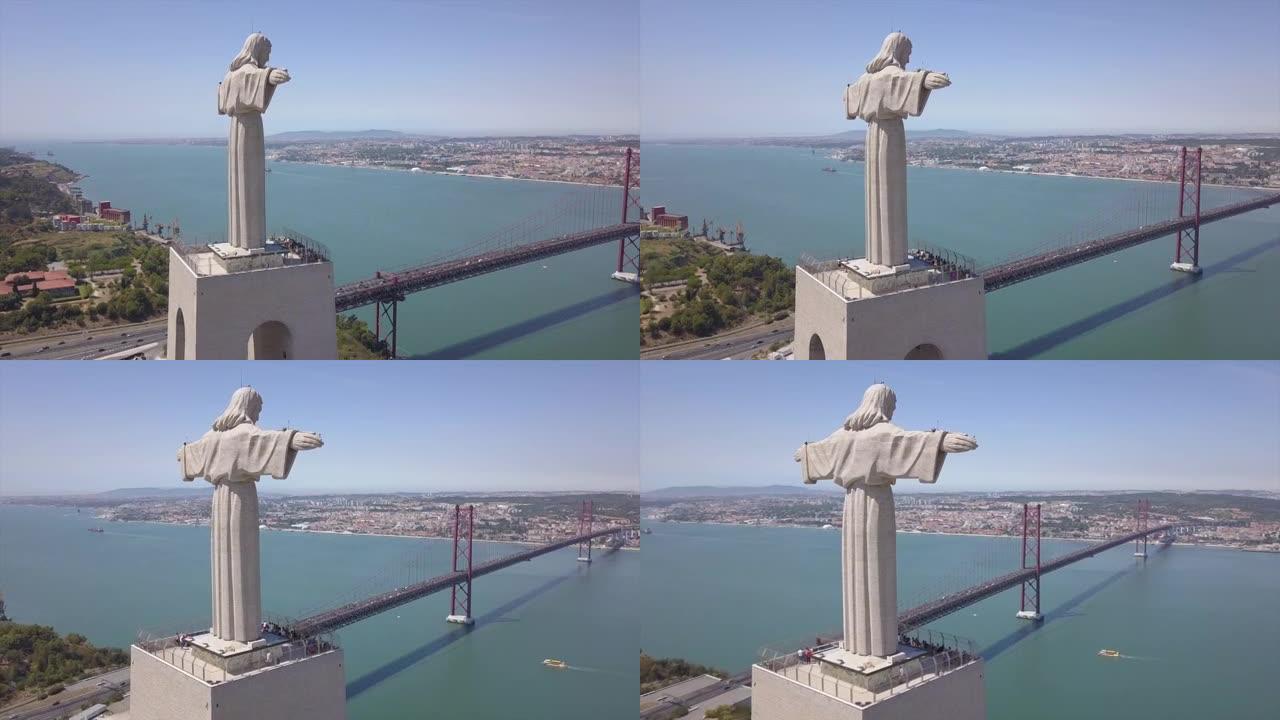 阳光灿烂的一天里斯本市基督国王著名纪念碑航空全景4k葡萄牙
