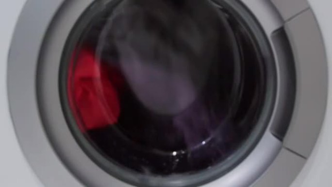 洗衣机滚筒旋转不同的衣物物体
