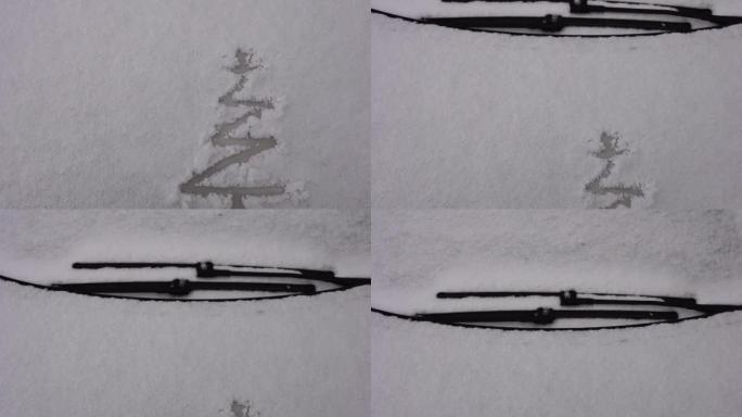 雪背景。潮湿的雪的纹理与圣诞树符号图案在冬季车窗的户外特写。雪中微笑，快乐开朗的形象。冬季时间概念