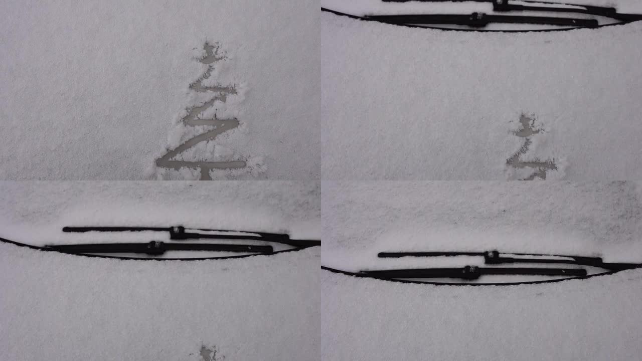 雪背景。潮湿的雪的纹理与圣诞树符号图案在冬季车窗的户外特写。雪中微笑，快乐开朗的形象。冬季时间概念