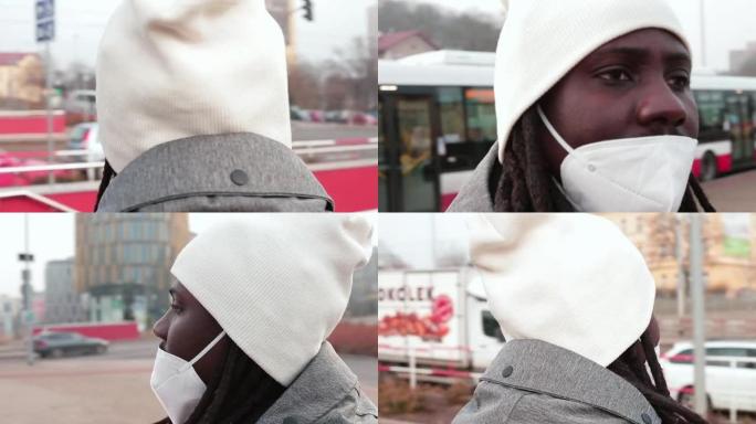 圆形肖像，一个黑人戴着白色口罩呼吸器。等待巴士站。