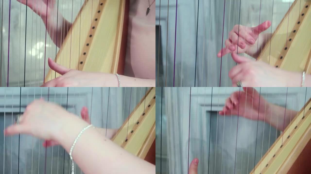 这个女孩弹竖琴。全景。手和弦的特写