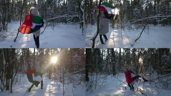 冬季光环中带有阿拉伯联合酋长国国旗的女孩