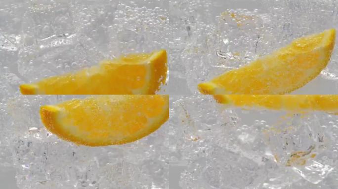 橙色切片掉在水中