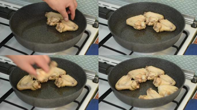 鸡翅放在煎锅里。