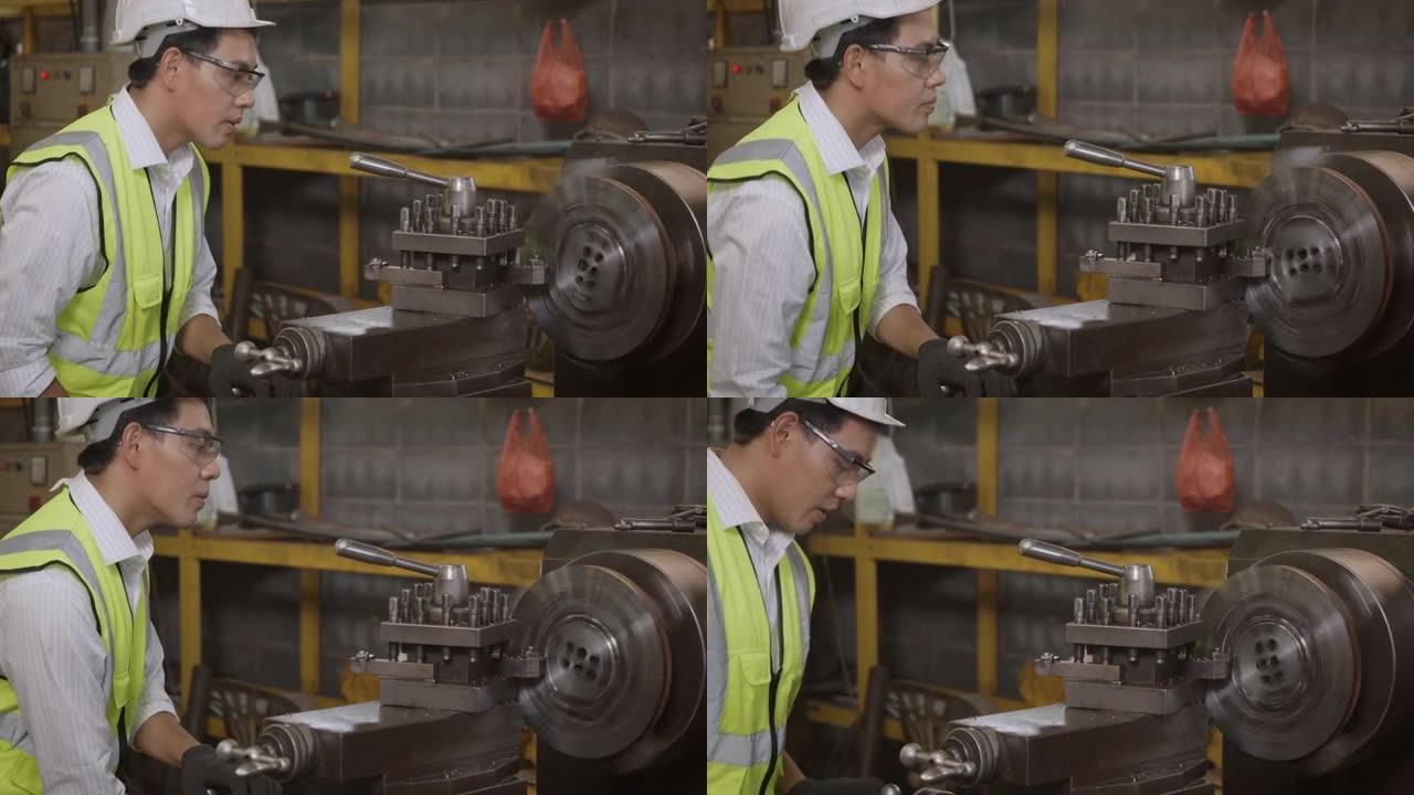 专业机械工程师或操作人员佩戴统一护目镜安全在车间金属车床工业上工作
