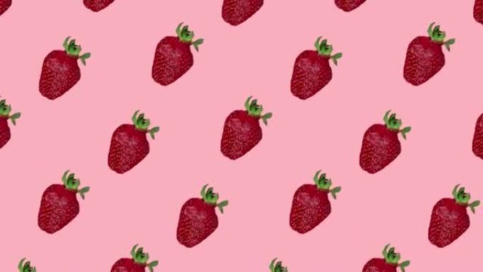 粉红色背景上的红色新鲜草莓的无缝循环动画图案。美丽多汁的浆果是收获和夏天的概念。带有复制空间的广告模