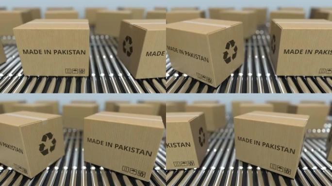 滚筒输送机上带有巴基斯坦制造文本的盒子