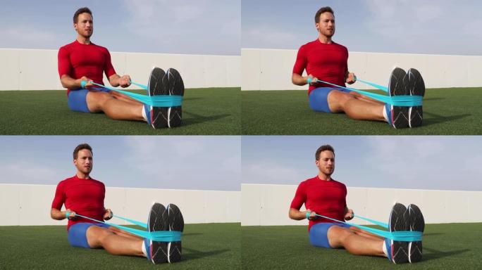 健身男子训练带阻力带的手臂做坐式排行运动