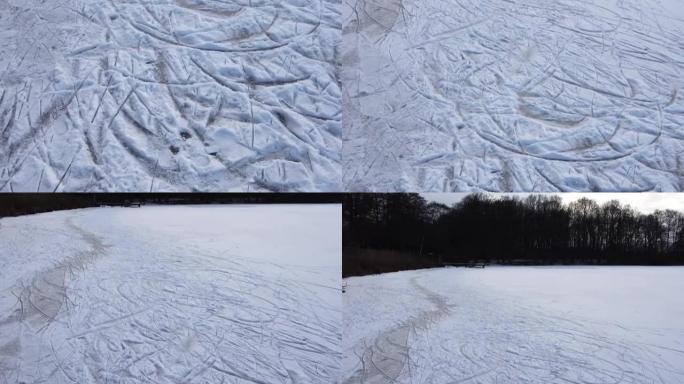 冬天在一个冰冻的湖边看，那里有很多溜冰道。