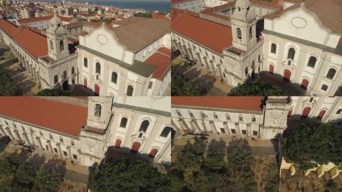 阳光明媚的日子里斯本著名的阿尔法玛区城市景观空中全景4k葡萄牙