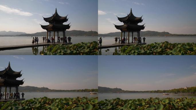 晴天时间杭州市著名的西湖码头海湾宝塔慢动作全景4k中国