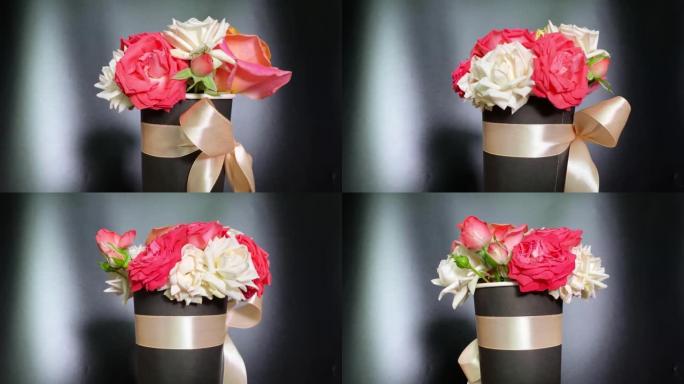 4k粉色和白色玫瑰花束旋转。给女人的鲜花礼物。一束鲜花在大理石白色和黑色背景上旋转。