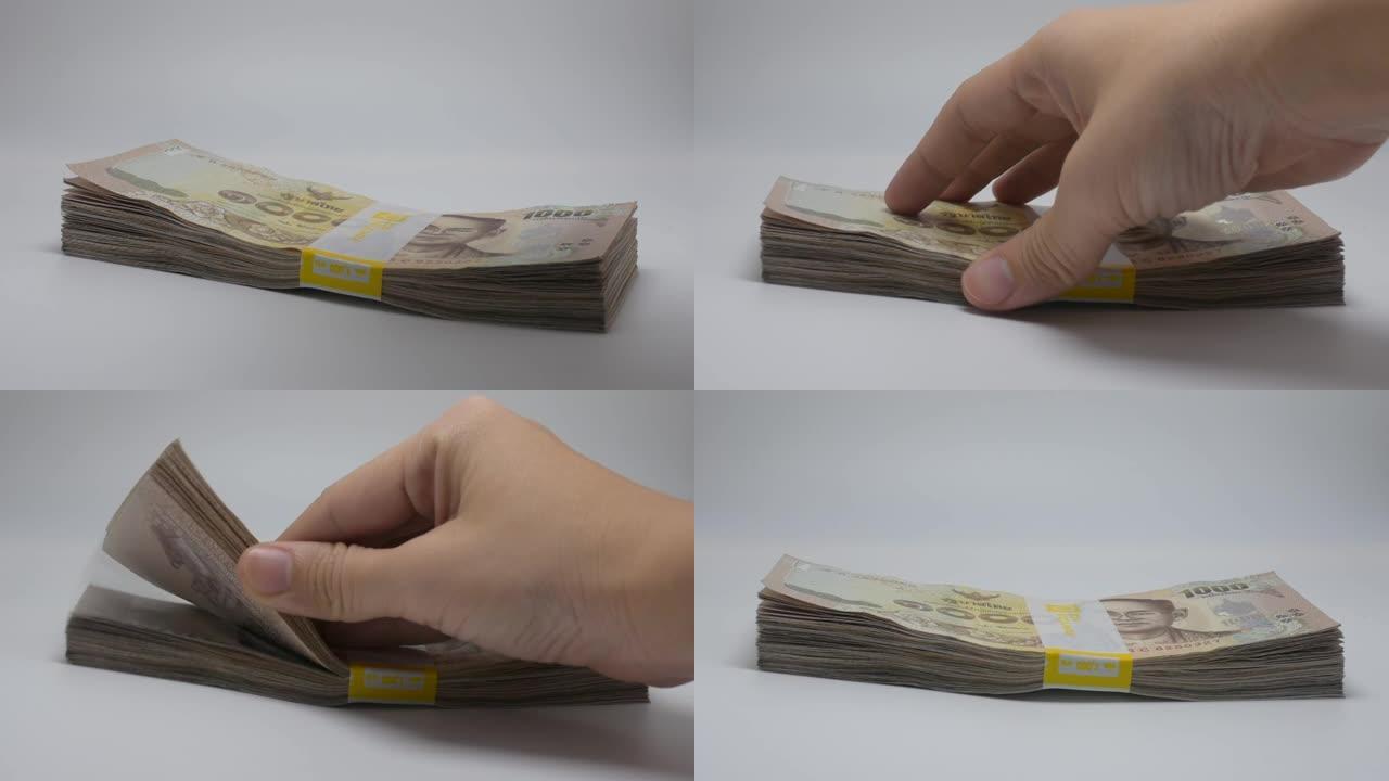 人们数泰铢钱，泰国钞票