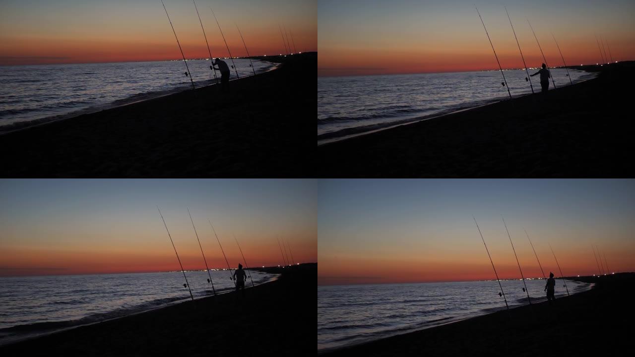 海上渔夫在日落时等待鱼，冲浪钓鱼现场
