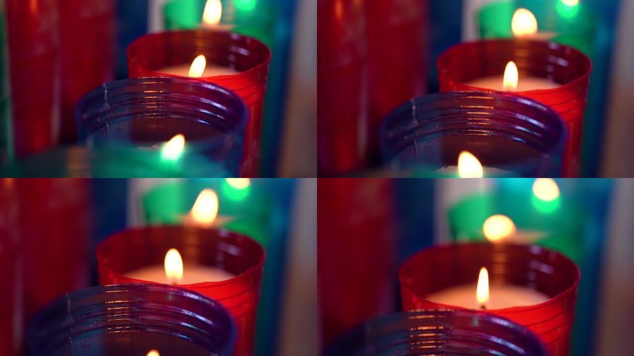 烛台上天主教堂内蜡烛的慢动作宏观镜头