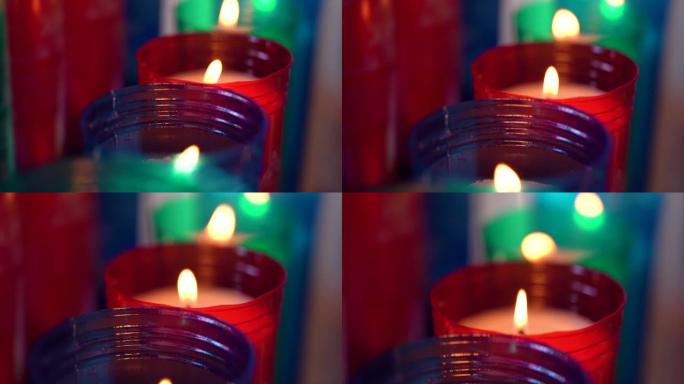 烛台上天主教堂内蜡烛的慢动作宏观镜头