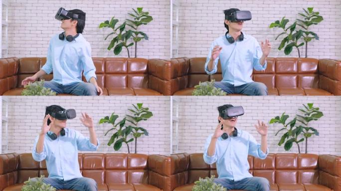 亚洲男子戴VR眼镜在家客厅玩看虚拟现实仿真世界