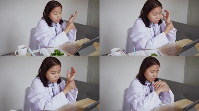 成人亚洲医生女性视频会议慢动作场景通过在办公室使用数字平板电脑与患者交谈远程医疗和技术生活方式概念
