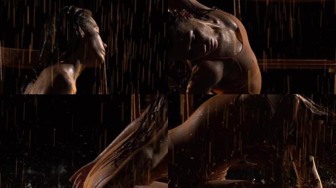 年轻芭蕾舞演员表演的当代芭蕾舞的感性编舞。在黑暗的工作室里，温柔潮湿的女人坐在椅子上，在倾盆大雨中平