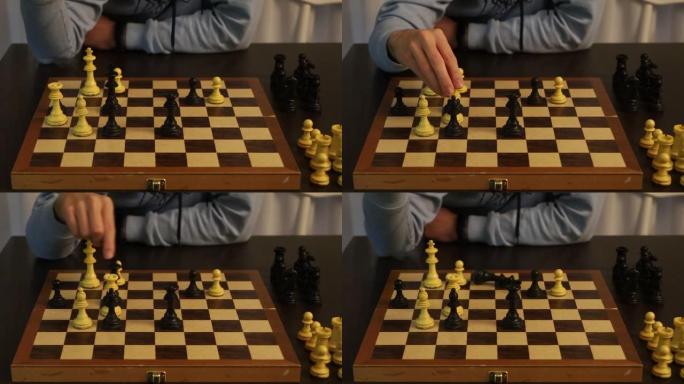 一个少年玩象棋棋盘游戏的视频，并以将死结束并将国王滚动在桌子上的动作。