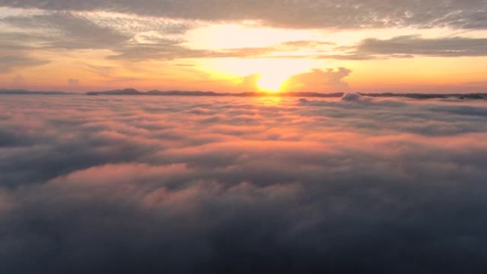 风景优美的空中无人机俯视图山脉美丽的日出雨林日出时有雾和薄雾，乐山，萨道，宋卡