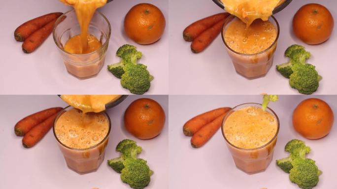 将橙汁倒入玻璃视频中的多种蔬菜