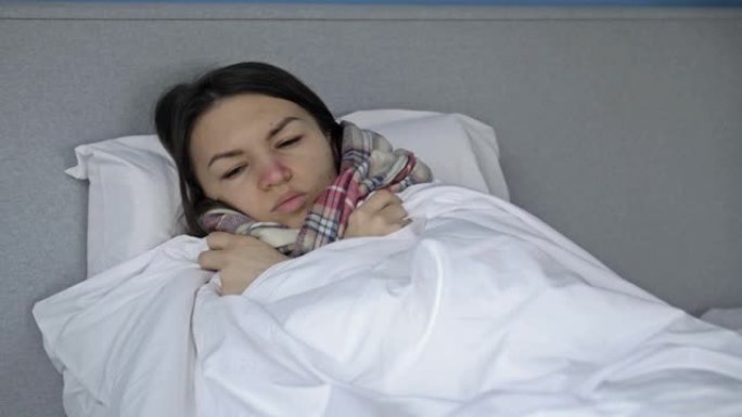 年轻女子生病了。她咳嗽，发冷，流鼻涕。流感、感冒或冠状病毒症状