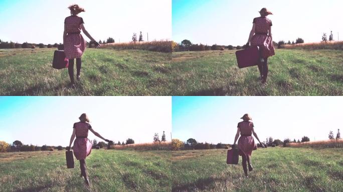 田野里的女孩，穿着圆点的裙子在风中摇曳。明亮的过度曝光视频，明亮的太阳的效果。造型视频。选择性聚焦，