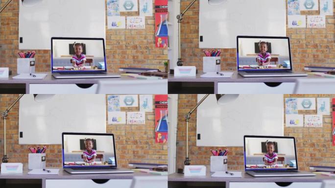 非裔美国女学生在学校桌子上的笔记本电脑上进行视频通话的网络摄像头视图