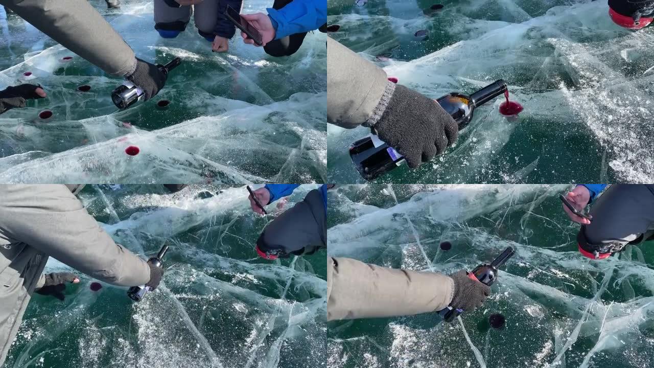 贝加尔湖之吻是游客的娱乐。一名男子将葡萄酒倒入冰冻的贝加尔湖的临时玻璃杯中。